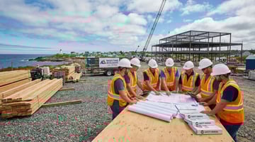 COR certification guide for Nova Scotia contractors with safety professional reviewing documentation on construction site